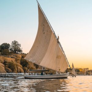 White Sail Boat on Water